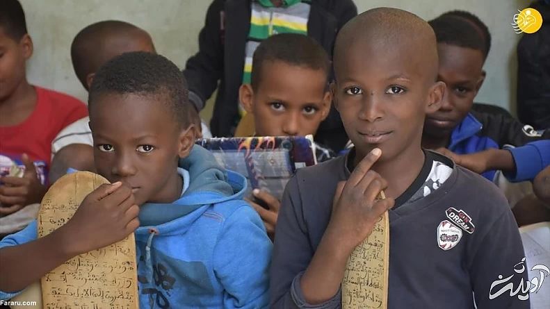 (تصاویر) کودکانی که با تخته چوبی حافظ قرآن می&zwnj;شوند